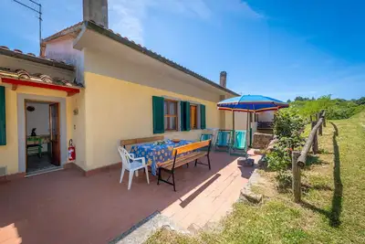 Image de Maison de vacances 'Poggio6' avec piscine partagée, terrasse privée et Wi-Fi
