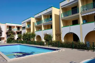 Image de Appartement pour sept personnes dans une résidence avec piscine