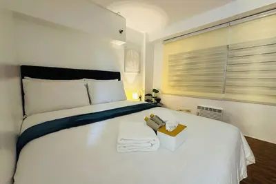 Image de Cozy 2-bedroom condo with Ac and WiFi in charming Mandaluyong
