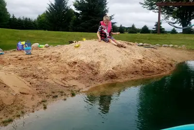 Image de Spacious 4-bedroom with Ac, fitness room, WiFi  and manmade pond in Oshkosh.