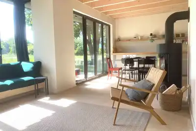 Image de Bright vacation home on Lake Zenssee with fireplace and terrace