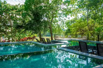 Modern condo with on-site pool, WiFi, and centrally located