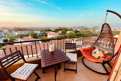 Image de Holiday apartment or home office with a view of Lisbon & the Atlantic coast.