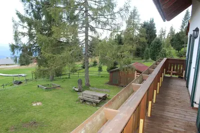 Image de Appartement 'Wohnung 3' avec vue sur les montagnes, terrasse et jardin partagés