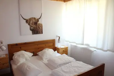 Image de Appartement 'Wohnung 1' avec vue sur la montagne, terrasse partagée et jardin partagé