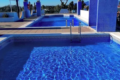 Image de Ria Ria Del Mar is only 100 meters from the beautiful natural sandy beach! \n