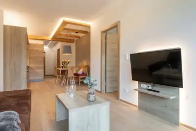 Image de Bel appartement avec sauna et terrasse