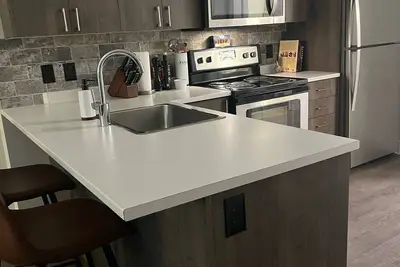 Downtown Location. . . Blocks from the Beach!