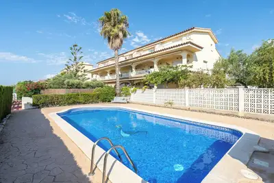 Image de Appartement 'Cap Roig, Appartement Duplex' avec piscine partagée, terrasse privée et balcon