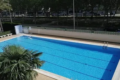 Appartement 'Alquilar Mas Comprar - Tere 2' avec piscine partagée, jardin privé et balcon