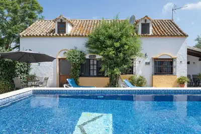 Image de Maison de vacances 'Casa El Pino' avec piscine partagée, Wi-Fi et climatisation