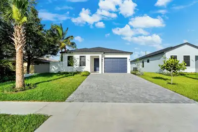 Image de Cozy 4-bedroom home with Ac and WiFi and more in delightful city of Greenacres