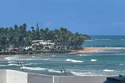 Image de Beautiful Beach and El Yunque views! Perfect located, newly updated condo!