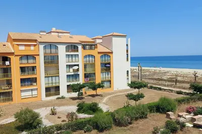 Image de Studio au bord de l'eau avec loggia, accès direct plage