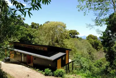 Image de \"Villa Arrayan\" The Cabin is surrounded by a private natural preserve.