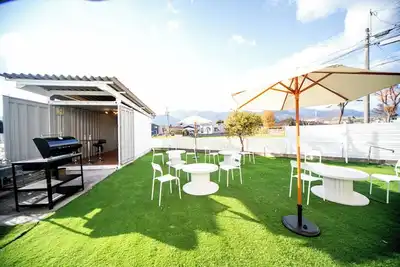 Image de Accommodates 20 people 1 minute from the station A large house where you can enjoy Bbq and table t / Miegun Mie