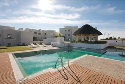 Image de Appartement moderne avec grande terrasse, barbecue, Proche du golf et courte distance de la plage