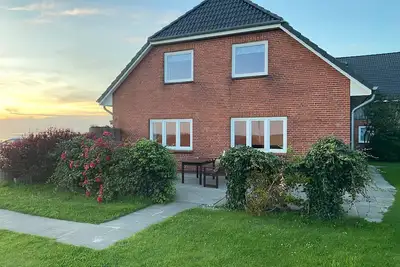 Image de Appartement 'Ferienwohnung Uthlande' avec terrasse partagée, jardin partagé et Wi-Fi