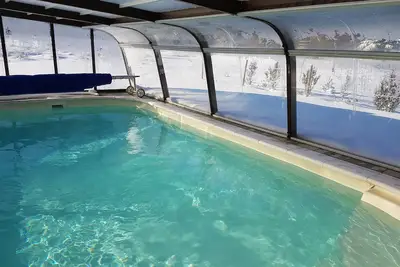 Image de Chalet 15 per Piscine Chauffée à 30° spa sauna boulodrome kota billard baby foot