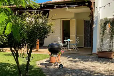 Image de Maison de vacances 'Villa dans le Parc Naturel d'Ugento' avec jardin privé et climatisation