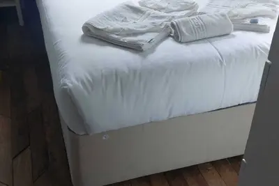 Cozy Basement Gem in Top Area