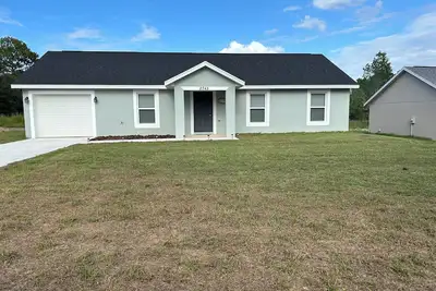 Image de Charming 3-bedroom with WiFi, Ac, big backyard, 8 minutes away from Wec & Hit.