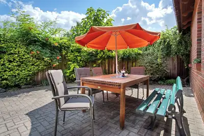 Image de Maison de vacances 'Ferienhaus Dorfidyll' avec terrasse privée, jardin privé et Wi-Fi