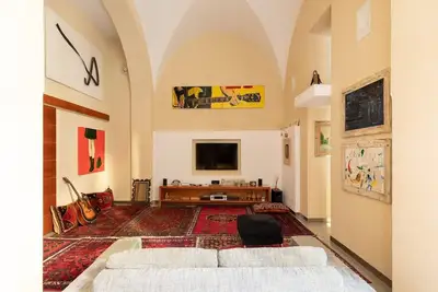Image de Dramatic Arches, Striking Architectural Apartment in Monti District Colosseum