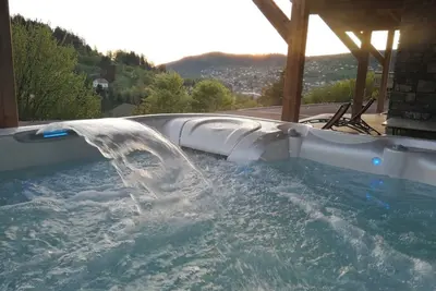 Image de Chalet d’exception 4 étoiles 14 personnes. Sauna Jacuzzi 5chambres