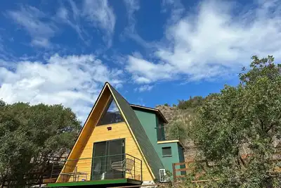 Image de Mountain Wooden House by the River with Playground