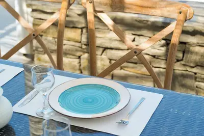 Image de Relax in Kolimpithres and enjoy the sunrise overlooking the sea of Naoussa Bay!