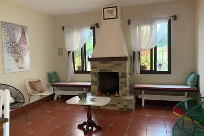 Pretty house with a most beautiful view of mountains and volcanoes!