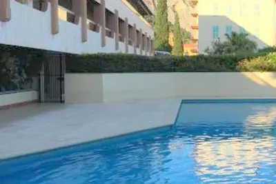 Image de Spacieux 2 pièces avec piscine, terrasse et parking, proche plages et commodités - Menton Garavan