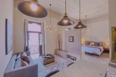 Image de Incredible suite with WiFi, Kitchen, living room, King Bed, balcony in Puebla