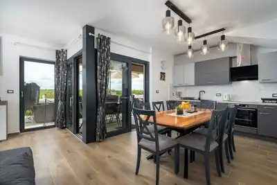 Image de Appartement de vacances avec jacuzzi et climatisation