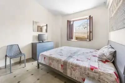 Image de Maison de vacances 'Arbus Aventino Centrale' avec terrasse privée et climatisation