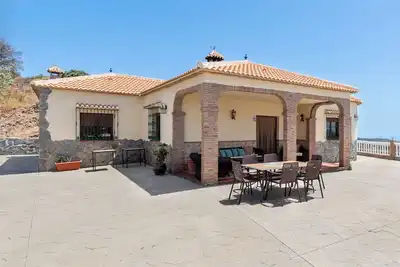 Image de Chalet Encantador en Málaga con Piscina y Chimenea