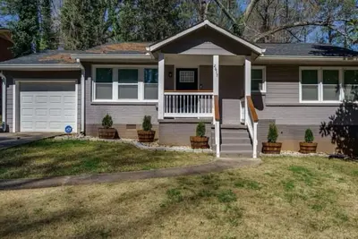 Image de Cozy 4-bedroom house in wonderful Atlanta with Bbq -10min to airport