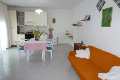 Image de Rilassati nella Nostra Suite Emma: Un Ambiente Familiare Vicino al Centro