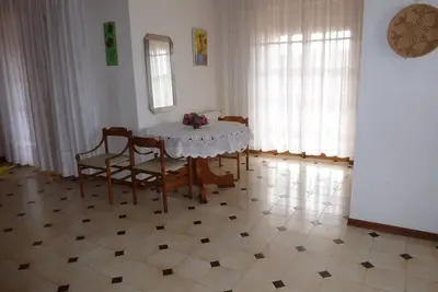 Image de Rilassati nella Nostra Suite Giulia: Un Ambiente Familiare Vicino al Centro