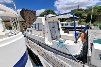 Image de Location de bateau à quai : confort pour 5 à Chenillé-Changé, Anjou