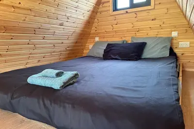 Image de Cozy Wooden House with Kids' Playground!