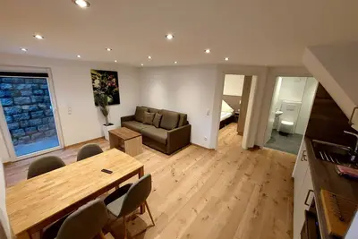 Appartement 'Apartement Erdgeschoss' avec vue sur les montagnes, terrasse privée et Wi-Fi
