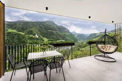 Image de Appartement \"Zweigelt\" avec vue sur les montagnes, piscine partagée et Wi-Fi
