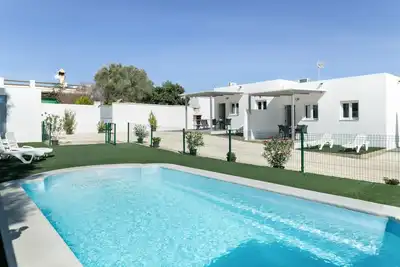 Image de Maison de vacances 'Apartamento La Esencia Del Sur A' avec piscine partagée, Wi-Fi et climatisation