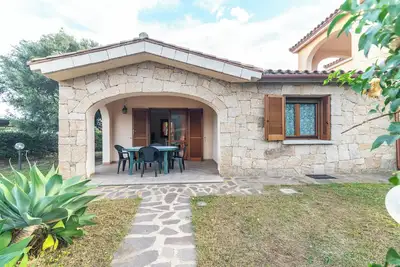 Image de Maison de vacances 'Villa San Teodoro' avec vue sur les montagnes, terrasse privée et climatisation