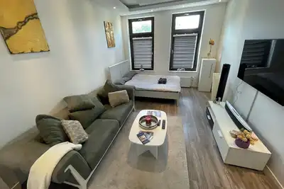 Image de Moderne Unterkunft in Küstennähe Zentrumsnah