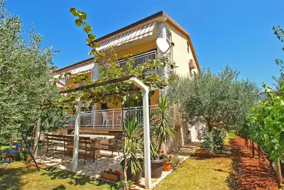 Image de Appartement de vacances avec jardin et barbecue