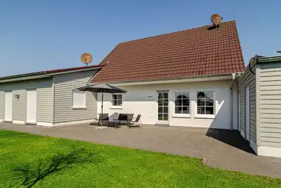 Image de Maison de vacances 'Ferienhaus Wiesmoor' avec terrasse privée, jardin privé et Wi-Fi