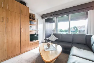 Image de \"Hus in't Melkerpad\": \"Steuerbord\" vacation apartment on Langeoog with beautiful loggia